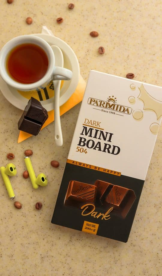 Styled product flat lay with coffee and chocolate